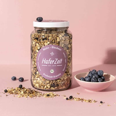 Organic granola poppy seed blueberry in a jar - muesli mix