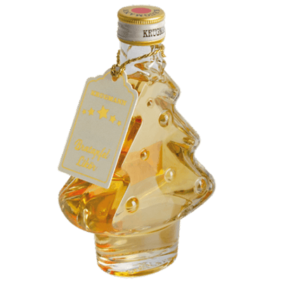 Baked apple liqueur in a Christmas tree bottle
