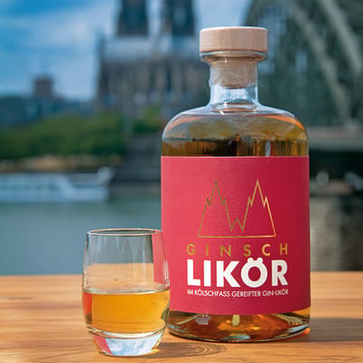 Ginsch gin liqueur aged in Kölsch barrel