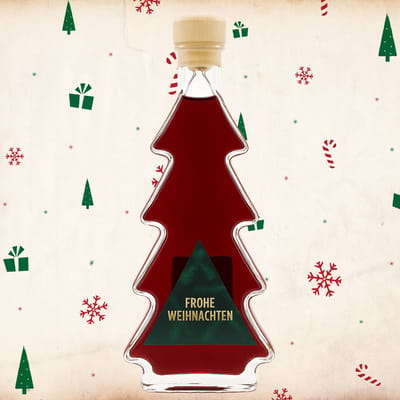 Deheck plum and cinnamon liqueur in a Christmas tree bottle