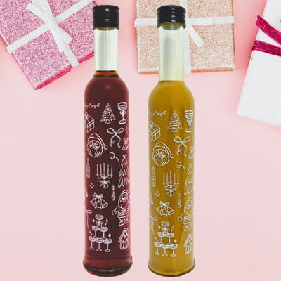 Deheck printed Christmas liqueur bottles (1x plum and cinnamon liqueur + 1x speculoos cream liqueur)