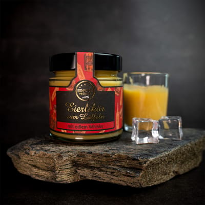 Altenburger egg liqueur with a spoonful of whisky